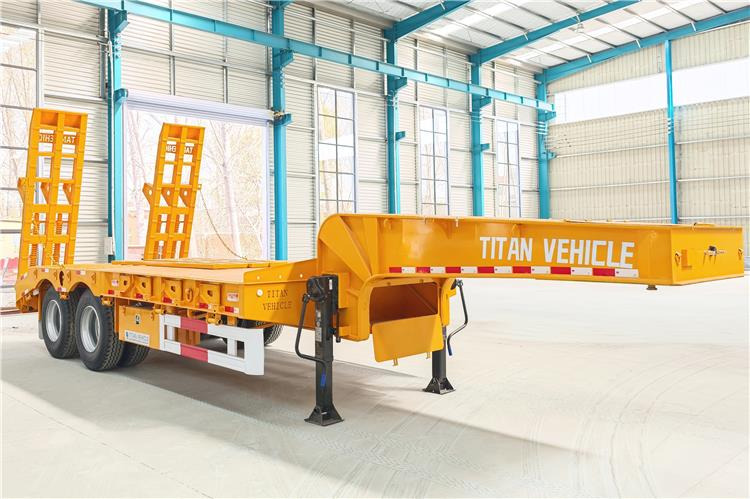 TITAN 2 Axle Low Loader Truck Trailer for Sale In Uganda - Semi-remorque surbaissé: photos 1 TITAN 2 Axle Low Loader Truck Trailer for Sale In Uganda - Semi-remorque surbaissé: photos 1