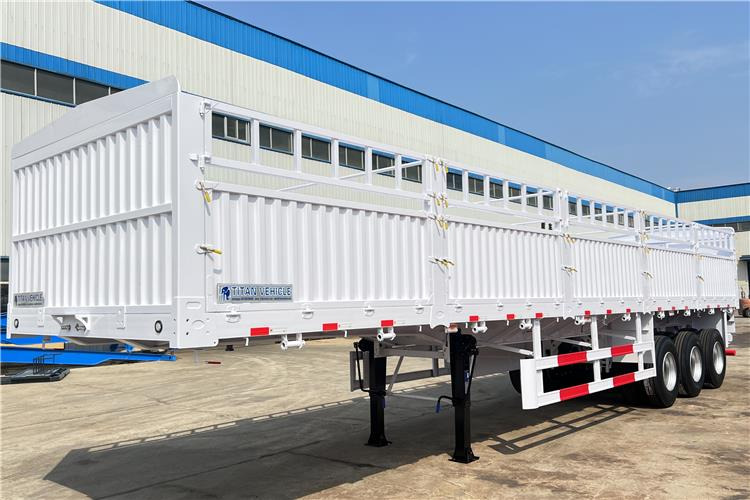 TITAN Tri Axle 60 Ton Fence Cargo Semi Trailer for Sale In Guinea - Semi-remorque bétaillère: photos 2 TITAN Tri Axle 60 Ton Fence Cargo Semi Trailer for Sale In Guinea - Semi-remorque bétaillère: photos 2