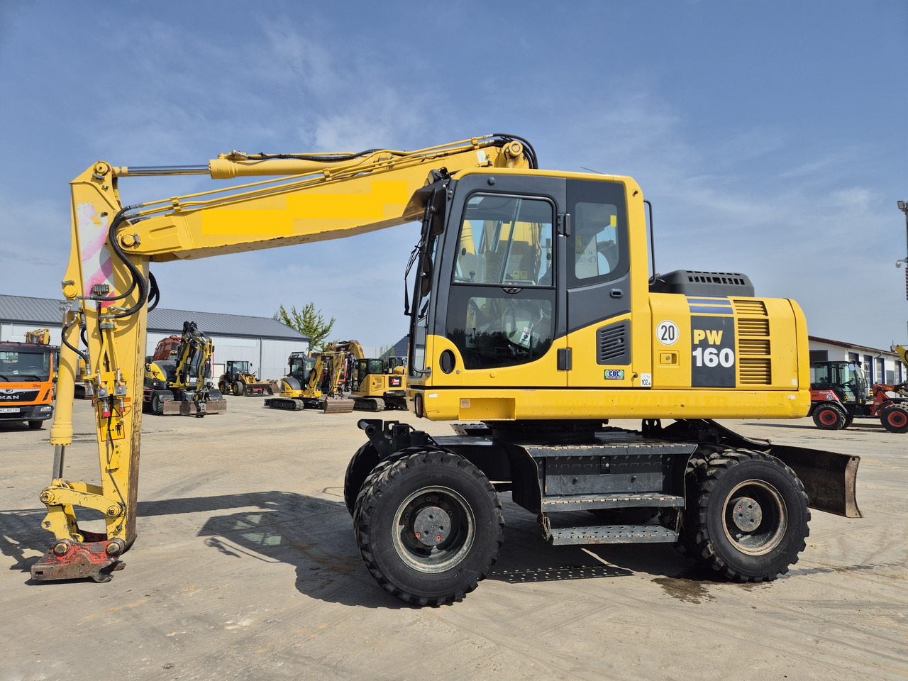 KOMATSU PW 160 - 8 - Pelle sur pneus: photos 1 KOMATSU PW 160 - 8 - Pelle sur pneus: photos 1