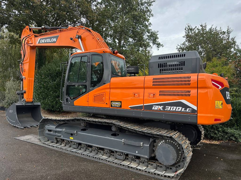 Develon DX 300 LC-7M - Pelle sur chenille: photos 1 Develon DX 300 LC-7M - Pelle sur chenille: photos 1