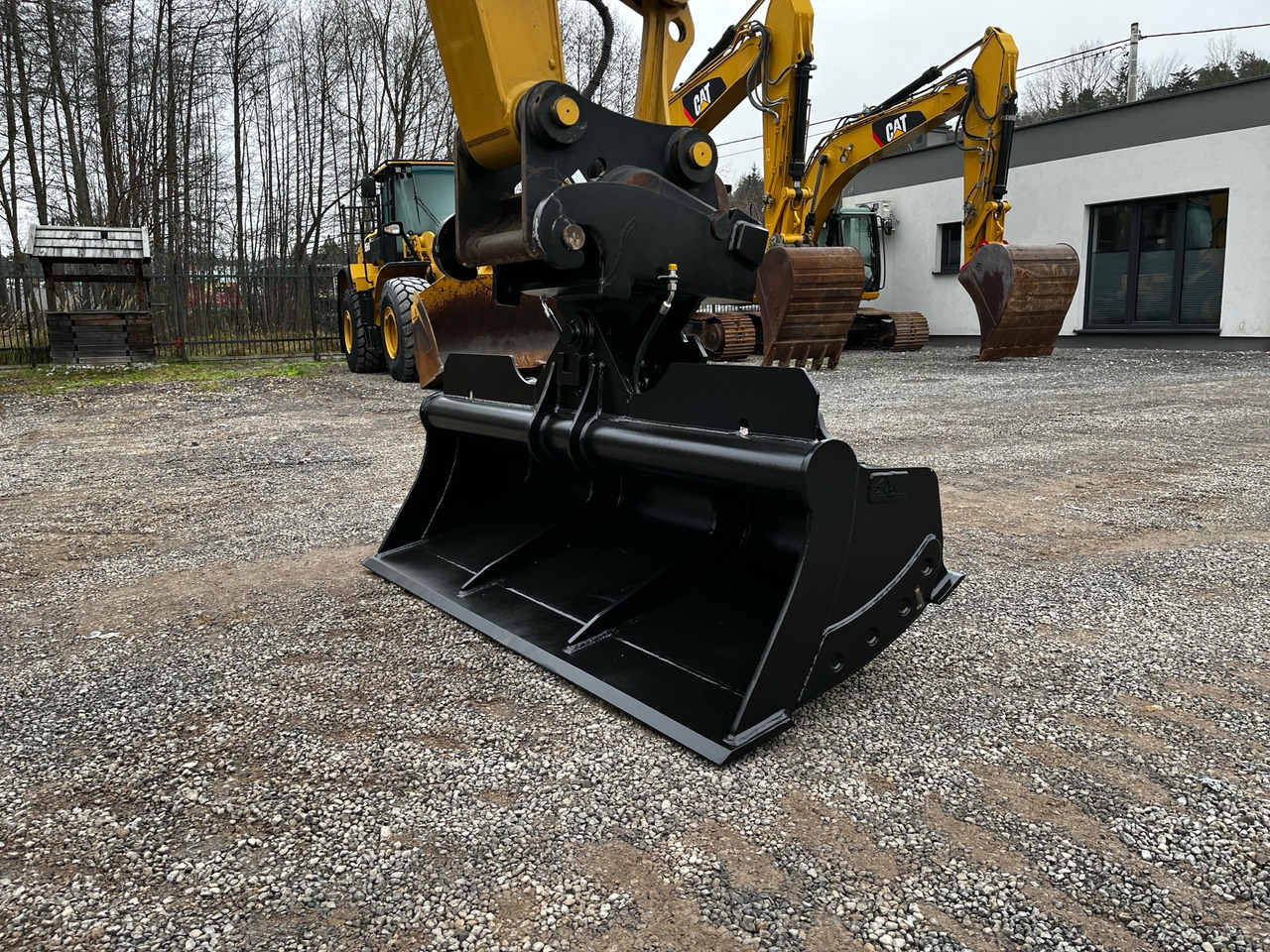 Łyżka skarpowa hydraulicznie uchylna CW40 - Godet pour pelle: photos 1 Łyżka skarpowa hydraulicznie uchylna CW40 - Godet pour pelle: photos 1