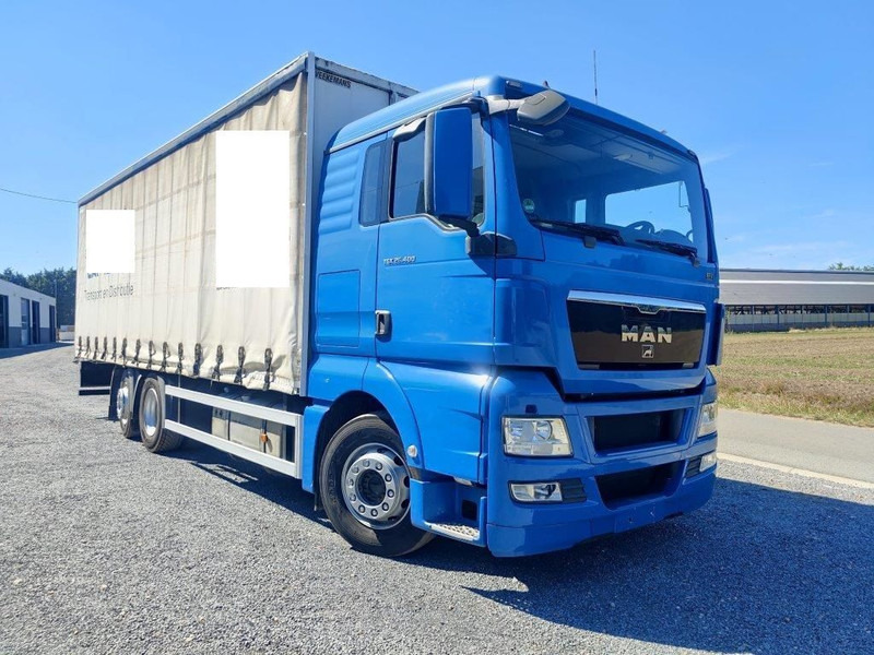 MAN TGS 26.400 Euro 5 Schuifzeilenbak / Curtains - Camion à rideaux coulissants: photos 2 MAN TGS 26.400 Euro 5 Schuifzeilenbak / Curtains - Camion à rideaux coulissants: photos 2