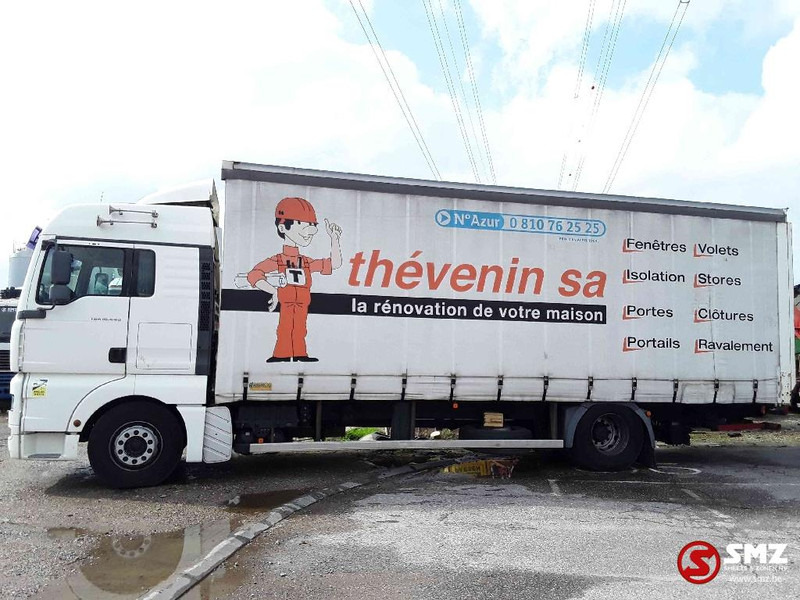 MAN TGA 18.440 - Camion à rideaux coulissants: photos 5 MAN TGA 18.440 - Camion à rideaux coulissants: photos 5