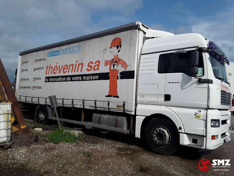 MAN TGA 18.440 - Camion à rideaux coulissants: photos 4 MAN TGA 18.440 - Camion à rideaux coulissants: photos 4