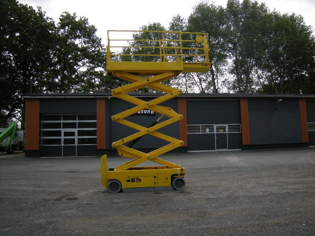 Genie GS 2632, Scherenarbeitsbühne Genie 10 m - Camion avec nacelle: photos 1 Genie GS 2632, Scherenarbeitsbühne Genie 10 m - Camion avec nacelle: photos 1