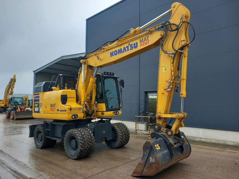 Komatsu PW180-11E0 - Pelle sur pneus: photos 1 Komatsu PW180-11E0 - Pelle sur pneus: photos 1