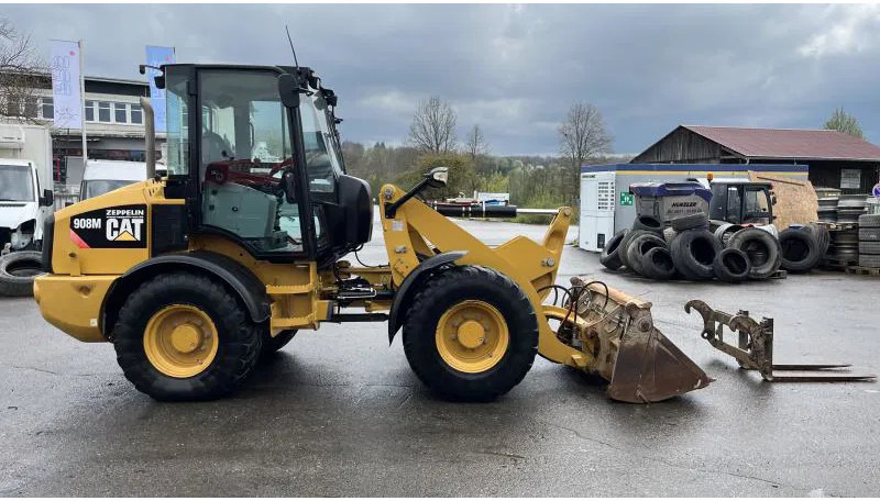 Caterpillar 908 M Klappschaufel+Pal.gabel Schnellwechsl. 908 M 4x4 Klappschaufel+Pal.gabel Schnellwechsl. - Chargeuse sur pneus: photos 1 Caterpillar 908 M Klappschaufel+Pal.gabel Schnellwechsl. 908 M 4x4 Klappschaufel+Pal.gabel Schnellwechsl. - Chargeuse sur pneus: photos 1
