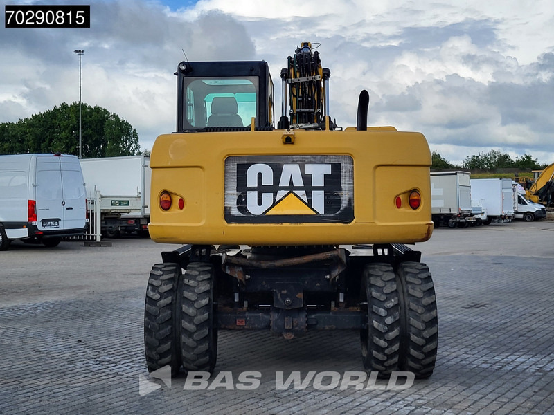 Caterpillar M313 D - Pelle sur pneus: photos 3 Caterpillar M313 D - Pelle sur pneus: photos 3