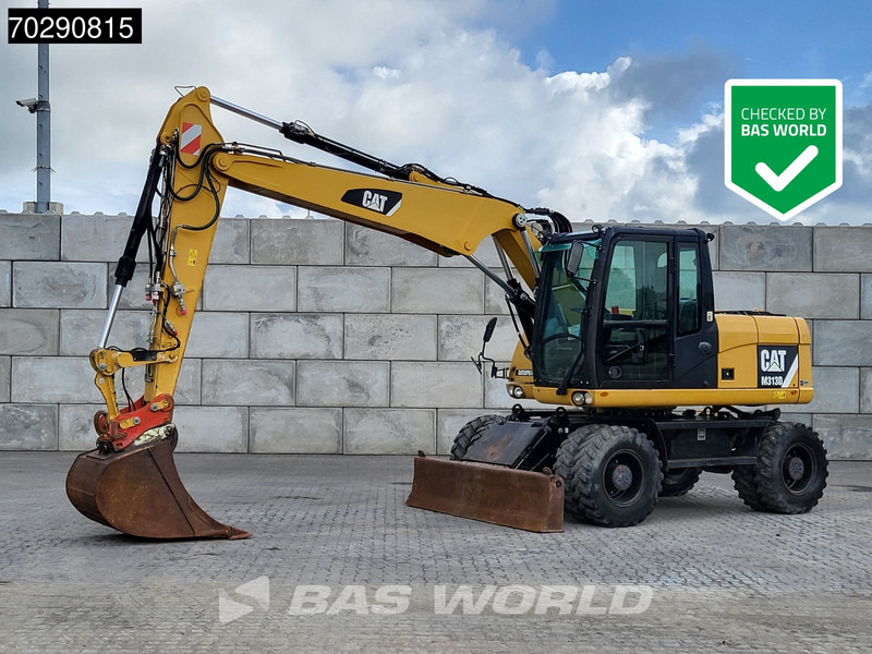 Caterpillar M313 D - Pelle sur pneus: photos 1 Caterpillar M313 D - Pelle sur pneus: photos 1