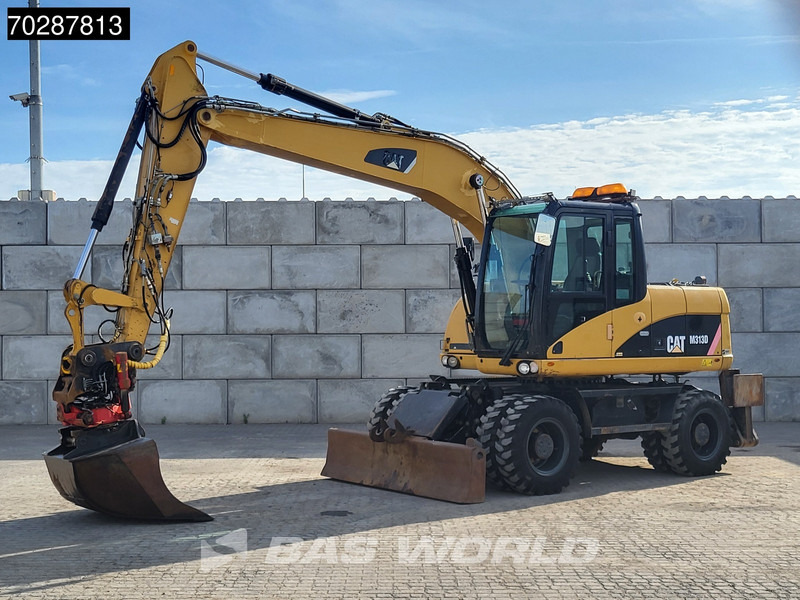 Caterpillar M313 D OUTRIGGERS + BLADE - Pelle sur pneus: photos 2 Caterpillar M313 D OUTRIGGERS + BLADE - Pelle sur pneus: photos 2