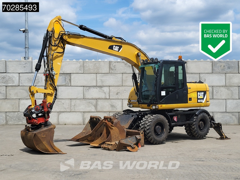 Caterpillar M313 D OUTRIGGERS + ROTOTILT - Pelle sur pneus: photos 1 Caterpillar M313 D OUTRIGGERS + ROTOTILT - Pelle sur pneus: photos 1