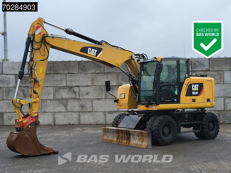 Caterpillar M314 F - Pelle sur pneus: photos 1 Caterpillar M314 F - Pelle sur pneus: photos 1