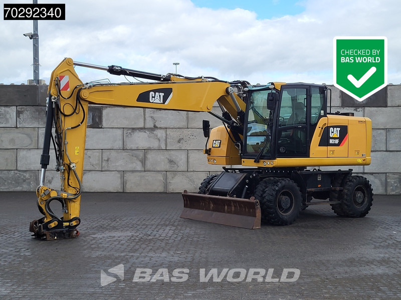 Caterpillar M318 F GERMAN MACHINE - Pelle sur pneus: photos 1 Caterpillar M318 F GERMAN MACHINE - Pelle sur pneus: photos 1