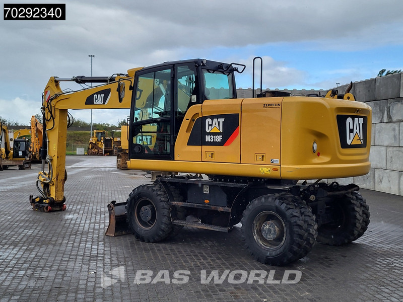 Caterpillar M318 F GERMAN MACHINE - Pelle sur pneus: photos 2 Caterpillar M318 F GERMAN MACHINE - Pelle sur pneus: photos 2