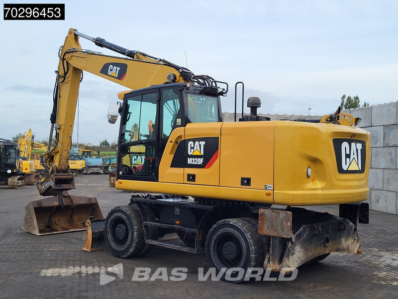 Caterpillar M320 F - Pelle sur pneus: photos 5 Caterpillar M320 F - Pelle sur pneus: photos 5