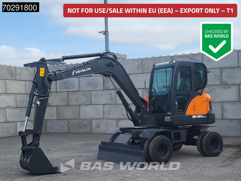Develon DX60 WN ECO-1 A/C - Pelle sur pneus: photos 1 Develon DX60 WN ECO-1 A/C - Pelle sur pneus: photos 1