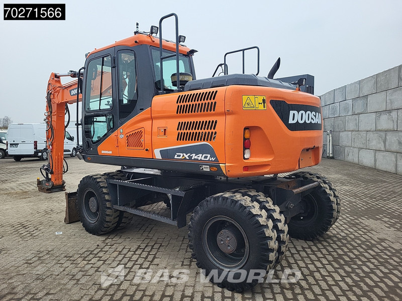 Doosan DX140 W-5 OIL QUICK - GERMAN - Pelle sur pneus: photos 2 Doosan DX140 W-5 OIL QUICK - GERMAN - Pelle sur pneus: photos 2