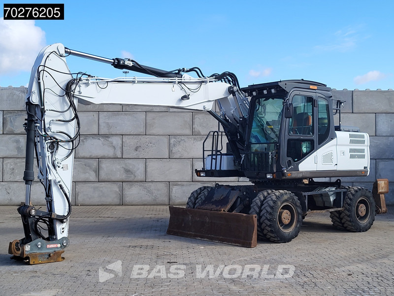 Doosan DX170 W-5 BLADE + OUTRIGGERS - Pelle sur pneus: photos 2 Doosan DX170 W-5 BLADE + OUTRIGGERS - Pelle sur pneus: photos 2