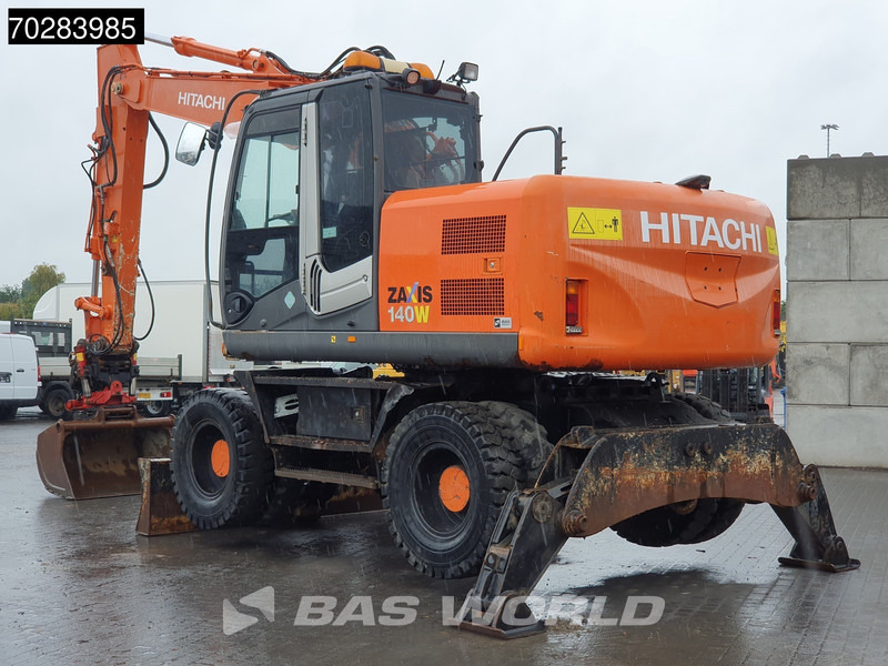 Hitachi ZX140W -3 OUTRIGGERS - ROTOTILT - Pelle sur pneus: photos 2 Hitachi ZX140W -3 OUTRIGGERS - ROTOTILT - Pelle sur pneus: photos 2