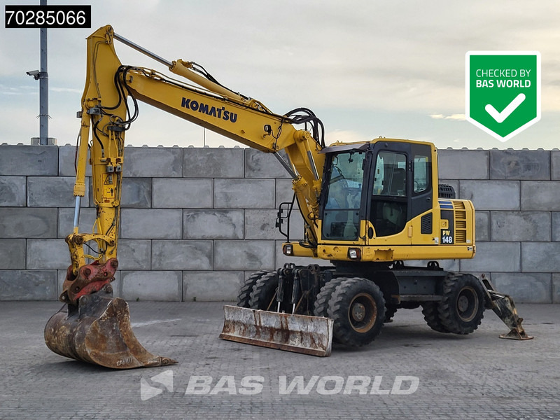 Komatsu PW148 -8 - Pelle sur pneus: photos 1 Komatsu PW148 -8 - Pelle sur pneus: photos 1