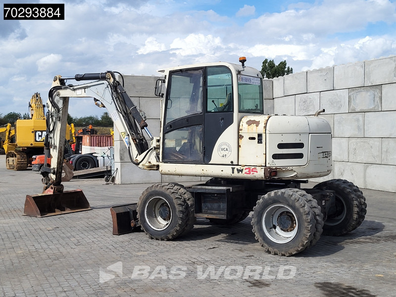 Pelle sur pneus Terex TW85: photos 6