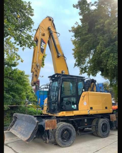 Caterpillar MH3022 - Pelle de manutention: photos 1 Caterpillar MH3022 - Pelle de manutention: photos 1