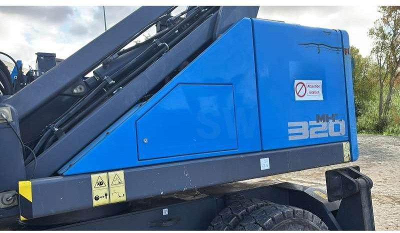 Fuchs MHL320F - Pelle de manutention: photos 3 Fuchs MHL320F - Pelle de manutention: photos 3