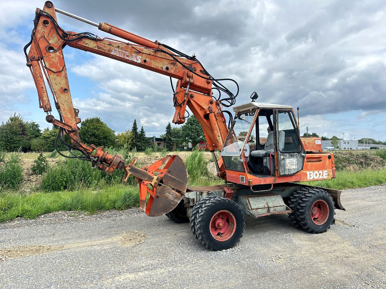 Atlas MOBILBAGGER 1302 E - Pelle sur pneus: photos 3 Atlas MOBILBAGGER 1302 E - Pelle sur pneus: photos 3
