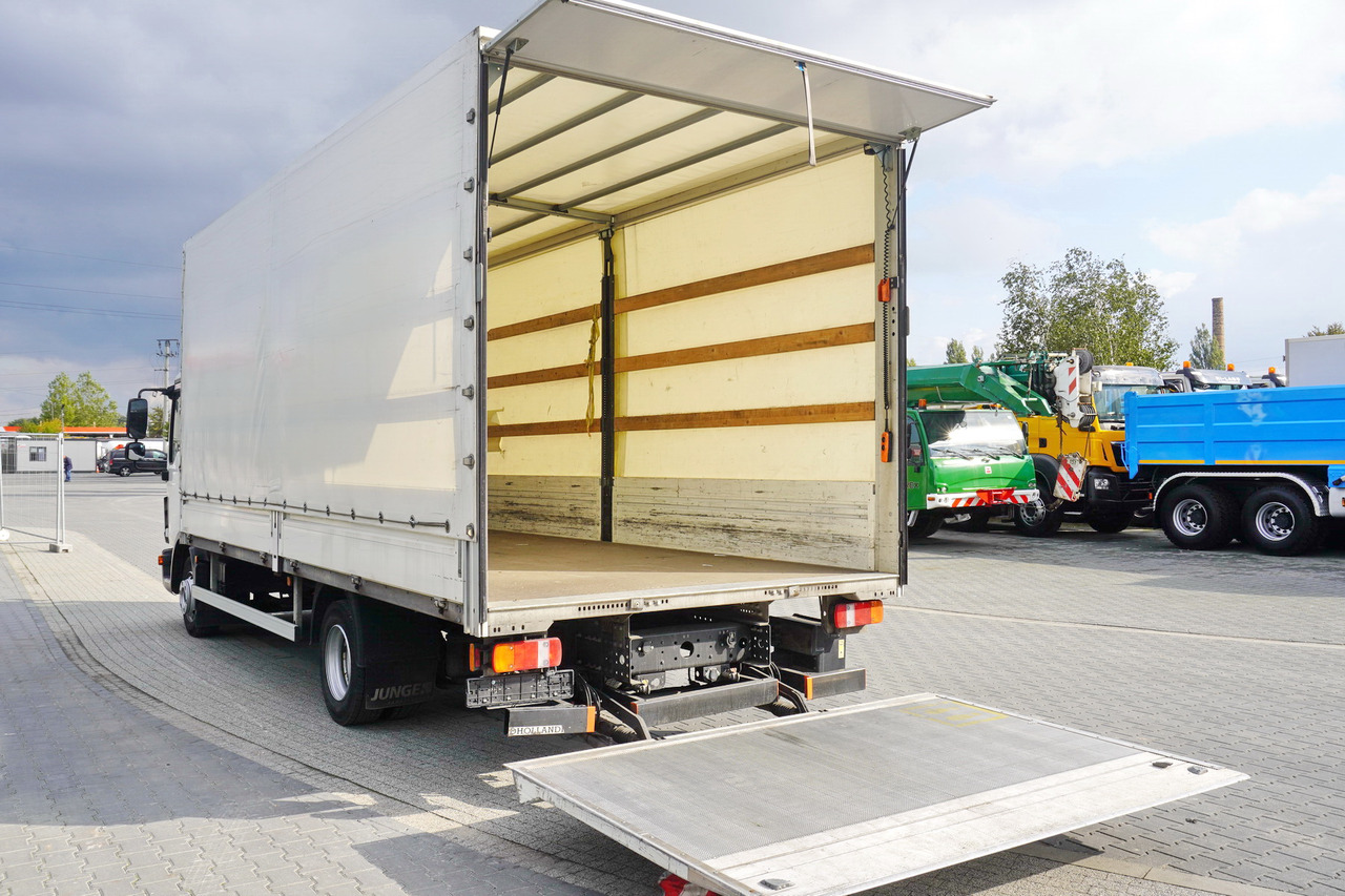 JUNGE Tarpaulin body + lift Dhollandia 1000 kg - Carrosserie bâchee: photos 1 JUNGE Tarpaulin body + lift Dhollandia 1000 kg - Carrosserie bâchee: photos 1
