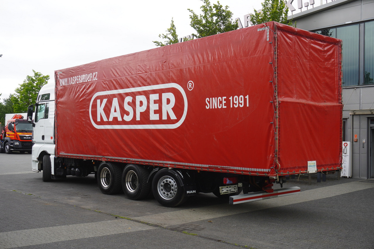 MAN TGX 35.580 E6 8x4 /4 / 23 EPAL tarp superstructure / 4th axle steered - Camion à rideaux coulissants: photos 3 MAN TGX 35.580 E6 8x4 /4 / 23 EPAL tarp superstructure / 4th axle steered - Camion à rideaux coulissants: photos 3