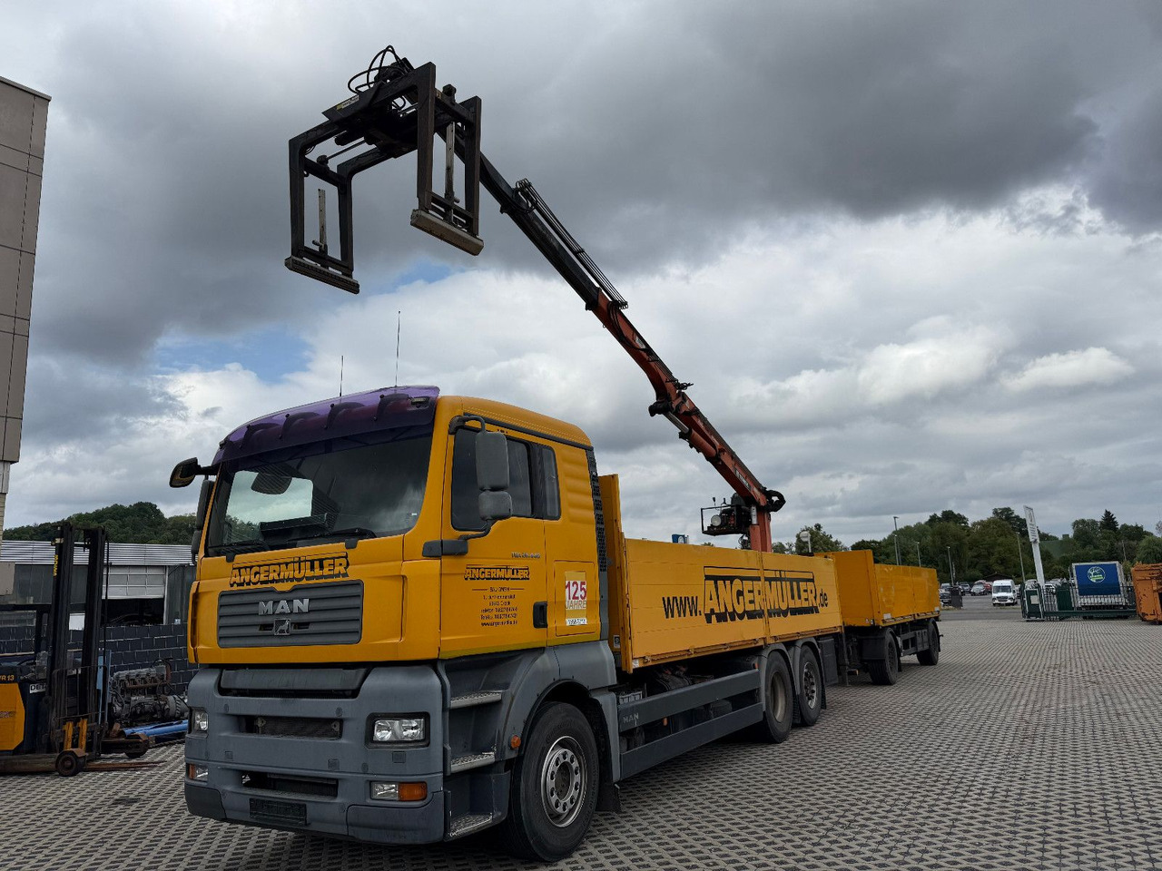 MAN TGA 26,440 TEREX TLC 165,2-A19 ACM SYSTEM - Camion grue: photos 1 MAN TGA 26,440 TEREX TLC 165,2-A19 ACM SYSTEM - Camion grue: photos 1