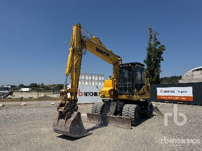 KOMATSU PW148-11 Pelle Sur Pneus - Pelle sur pneus: photos 1 KOMATSU PW148-11 Pelle Sur Pneus - Pelle sur pneus: photos 1