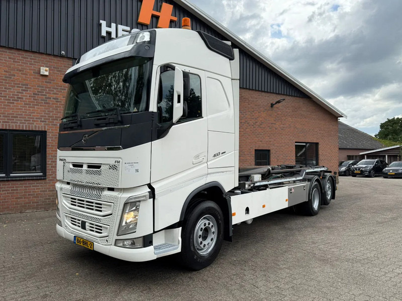 Volvo FH 460 6X2 VDL 25T Haakarm Standairco 9T Vooras Stuuras NL Truck - Camion ampliroll: photos 1 Volvo FH 460 6X2 VDL 25T Haakarm Standairco 9T Vooras Stuuras NL Truck - Camion ampliroll: photos 1