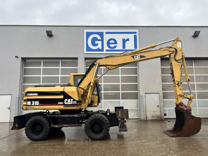 Caterpillar M 315 (111063) - Pelle sur pneus: photos 4 Caterpillar M 315 (111063) - Pelle sur pneus: photos 4