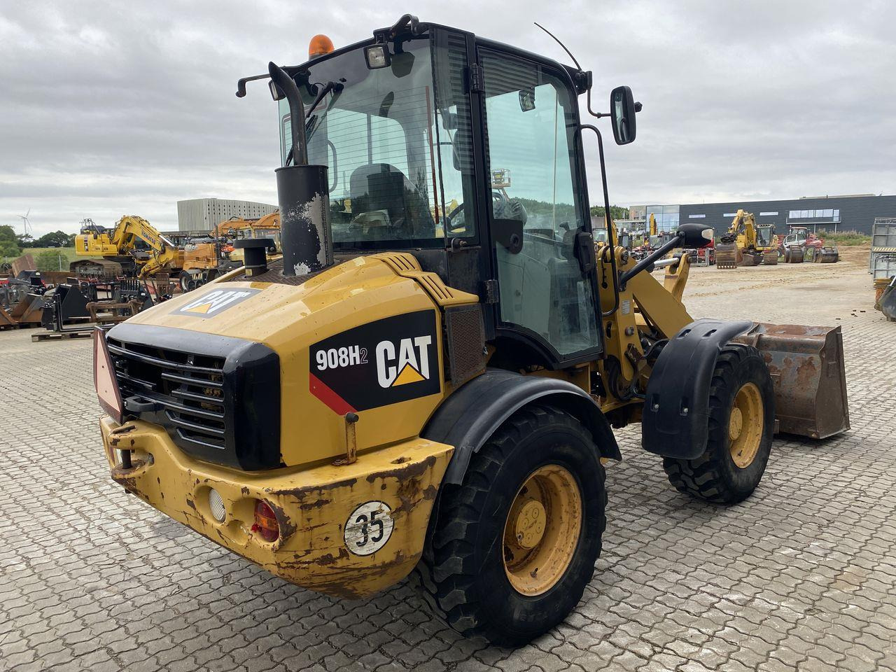 Caterpillar 908 H2 - Valet de ferme: photos 4 Caterpillar 908 H2 - Valet de ferme: photos 4
