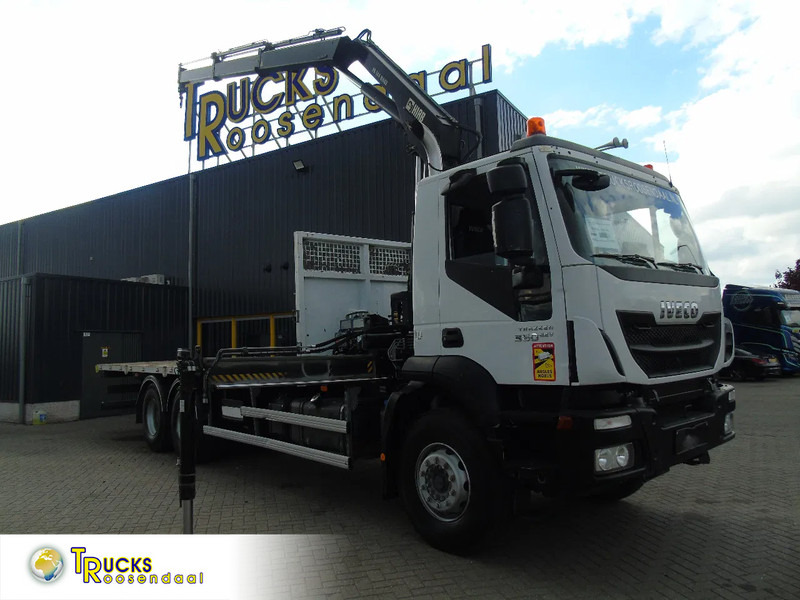 Iveco Eurotrakker 360 EEV + HIAB 144B- 2 + 6X4 + REMOTE + SPRING/BIG AXLE + EURO 5 - Camion grue: photos 1 Iveco Eurotrakker 360 EEV + HIAB 144B- 2 + 6X4 + REMOTE + SPRING/BIG AXLE + EURO 5 - Camion grue: photos 1