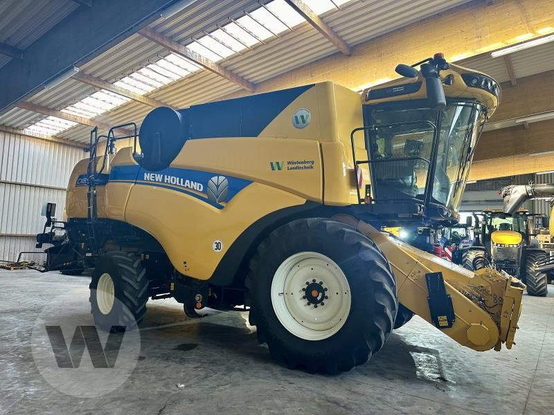 New Holland CX 8.90 - Moissonneuse-batteuse: photos 3 New Holland CX 8.90 - Moissonneuse-batteuse: photos 3