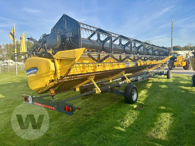 New Holland Schneidwerk 10,70 m - Moissoneuse: photos 1 New Holland Schneidwerk 10,70 m - Moissoneuse: photos 1