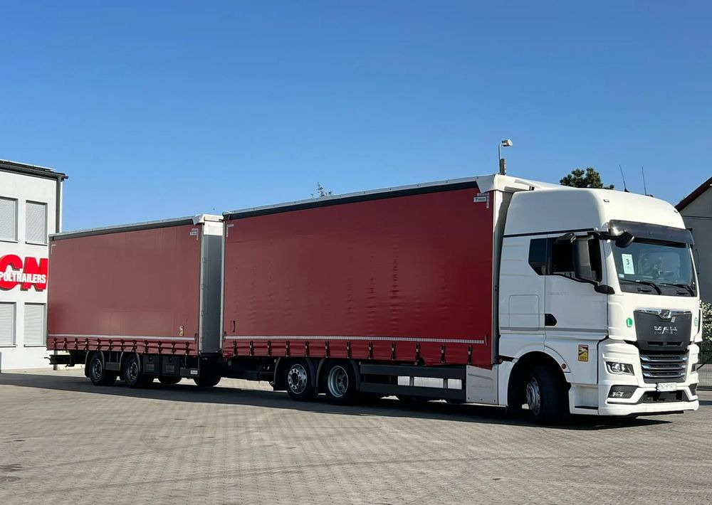 MAN TGX 26.470 z przyczepą Redos - Camion à rideaux coulissants, Remorque rideaux coulissants: photos 2 MAN TGX 26.470 z przyczepą Redos - Camion à rideaux coulissants, Remorque rideaux coulissants: photos 2