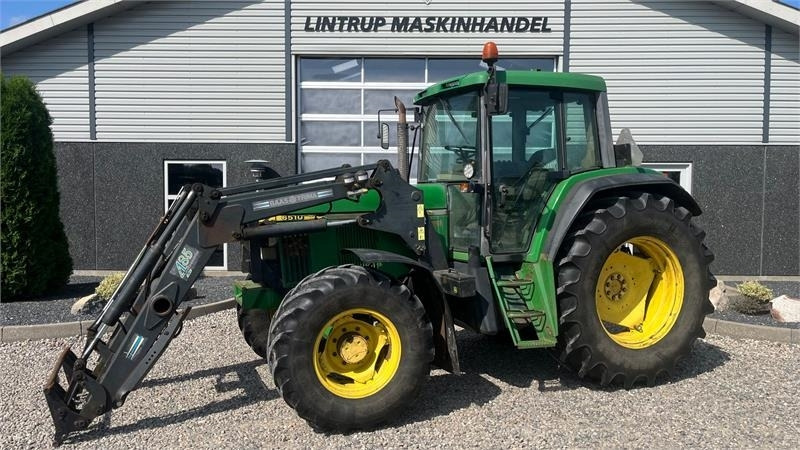 John Deere 6510 Med frontlæsser - Tracteur agricole: photos 1 John Deere 6510 Med frontlæsser - Tracteur agricole: photos 1