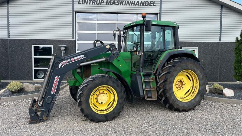 John Deere 6910 Auto Quad II-TLS Med frontlæsser  - Tracteur agricole: photos 1 John Deere 6910 Auto Quad II-TLS Med frontlæsser  - Tracteur agricole: photos 1