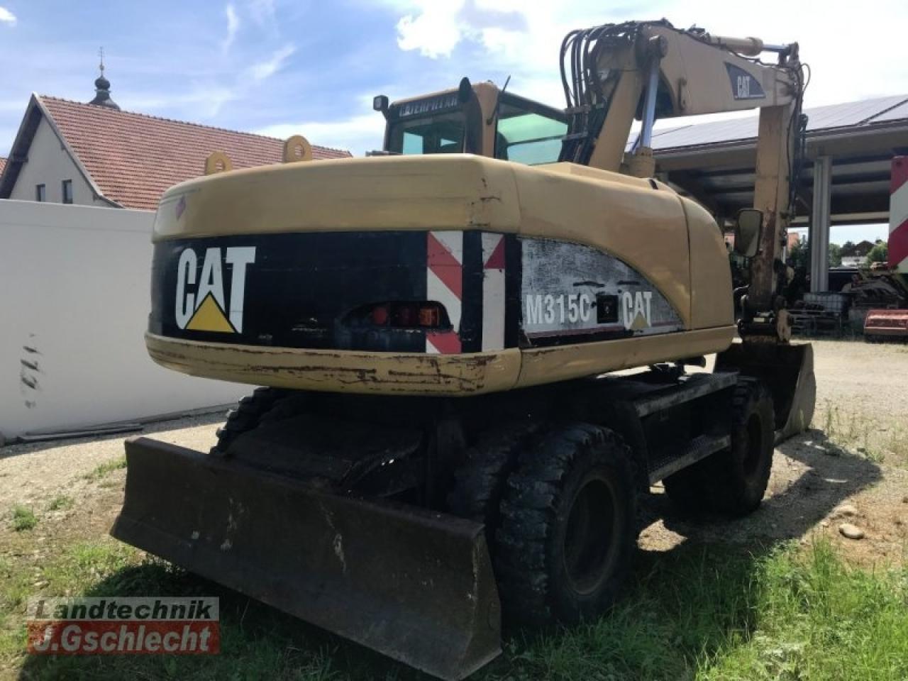 Caterpillar m 315c - Pelle sur pneus: photos 2 Caterpillar m 315c - Pelle sur pneus: photos 2