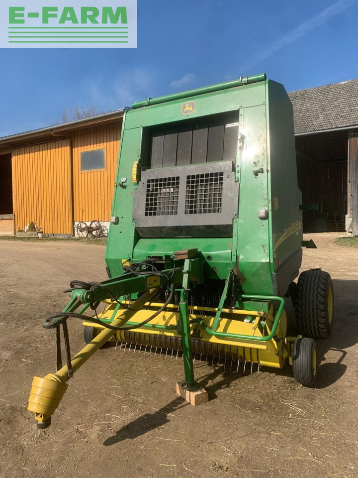 John Deere 592C - Presse à balles cubiques: photos 1 John Deere 592C - Presse à balles cubiques: photos 1