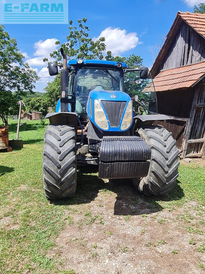New Holland T7050 - Tracteur agricole: photos 1 New Holland T7050 - Tracteur agricole: photos 1