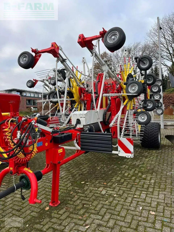 Pöttinger top 1252 c - Faneuse: photos 1 Pöttinger top 1252 c - Faneuse: photos 1