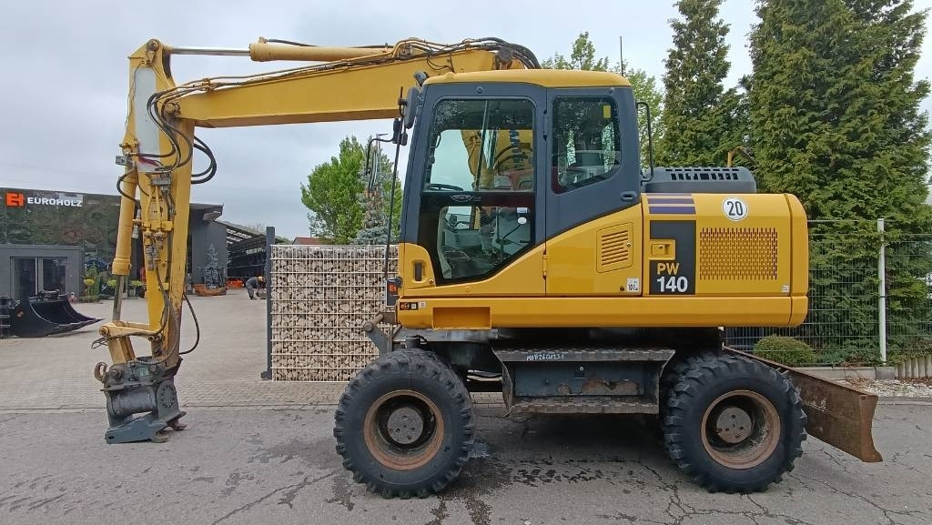 Komatsu PW 140 Mobilbagger Powertilt Schnellwechsler MS 10 - Pelle sur pneus: photos 1 Komatsu PW 140 Mobilbagger Powertilt Schnellwechsler MS 10 - Pelle sur pneus: photos 1