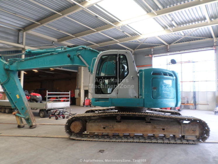 New Holland Kobelco Kobelco E 235 BSR-2 E 235 BSR-2 - Pelle sur chenille: photos 1 New Holland Kobelco Kobelco E 235 BSR-2 E 235 BSR-2 - Pelle sur chenille: photos 1