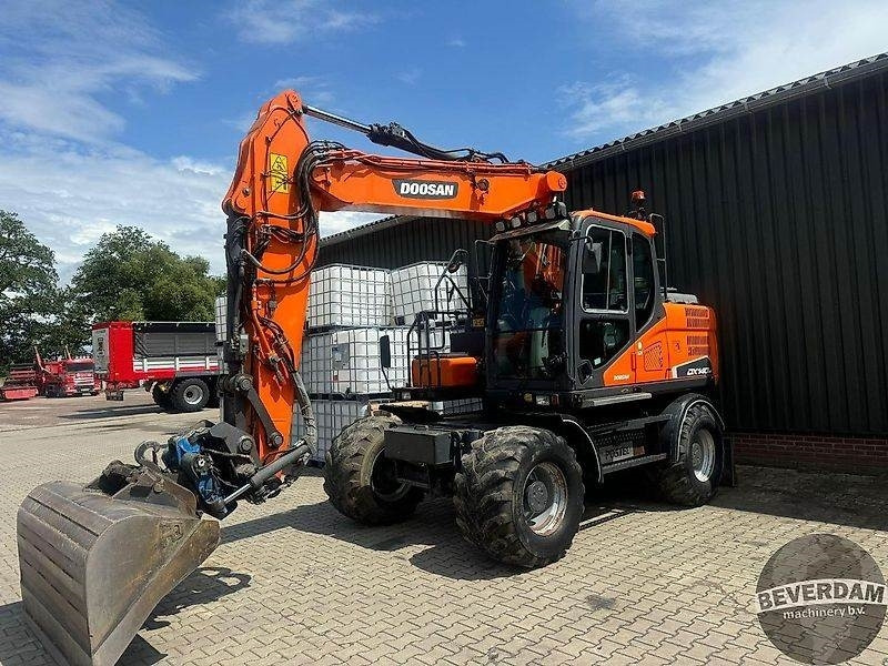 Doosan DX140W - Pelle sur chenille: photos 1 Doosan DX140W - Pelle sur chenille: photos 1