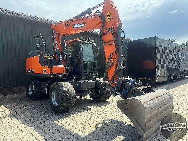 Doosan DX140W - Pelle sur chenille: photos 2 Doosan DX140W - Pelle sur chenille: photos 2