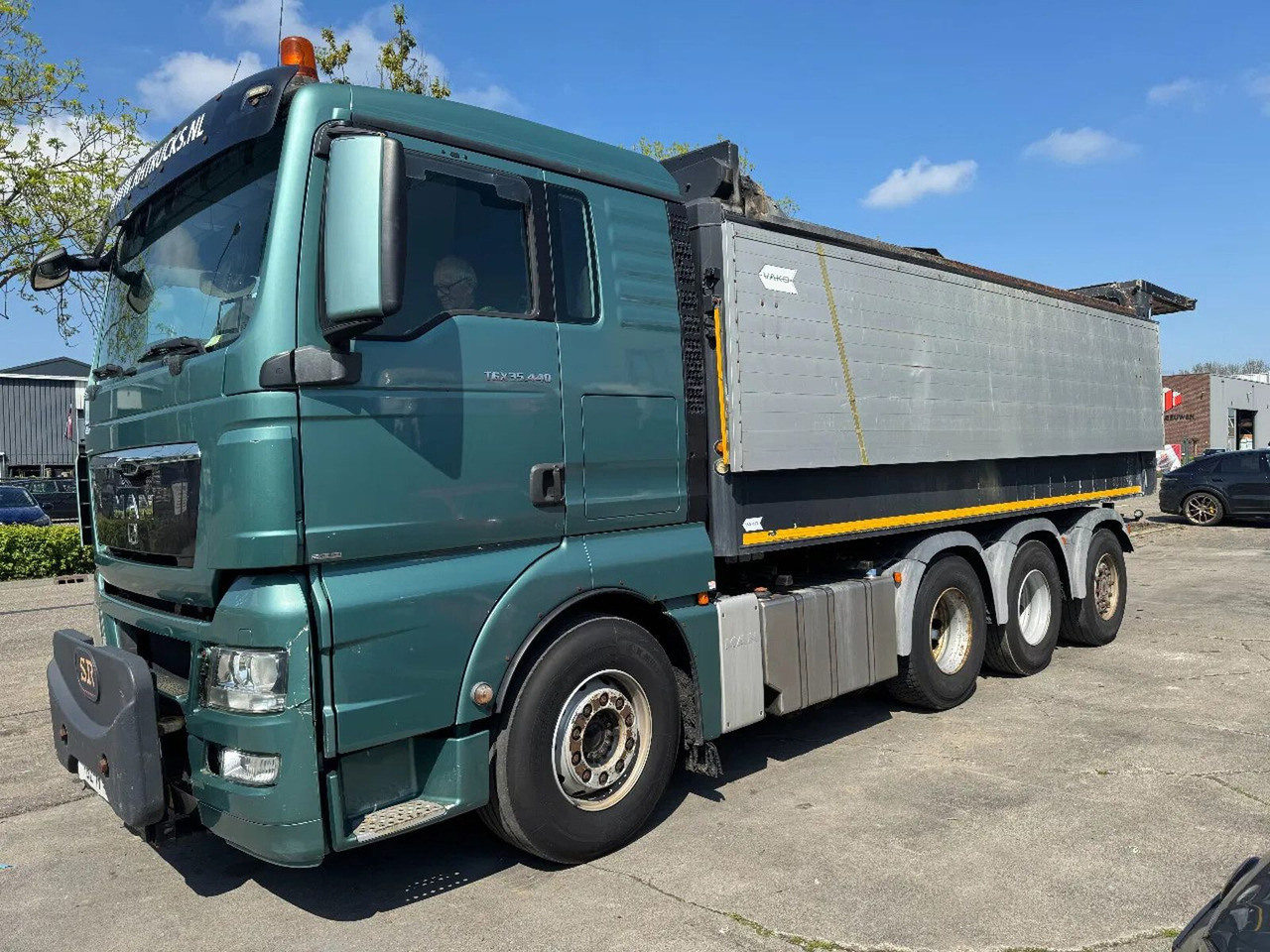 MAN TGX 35.500 8X4 VAKO BANDLOSSER - Camion: photos 1 MAN TGX 35.500 8X4 VAKO BANDLOSSER - Camion: photos 1